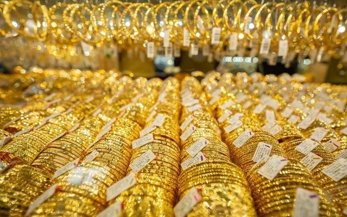 Giá vàng biến động mạnh, chuyên gia cảnh báo về thời điểm “dừng cuộc chơi”- Ảnh 1.