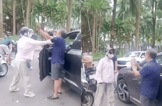 Va chạm giao thông: Người phụ nữ hành hung tài xế ô tô giữa đường phố - Ảnh 1.